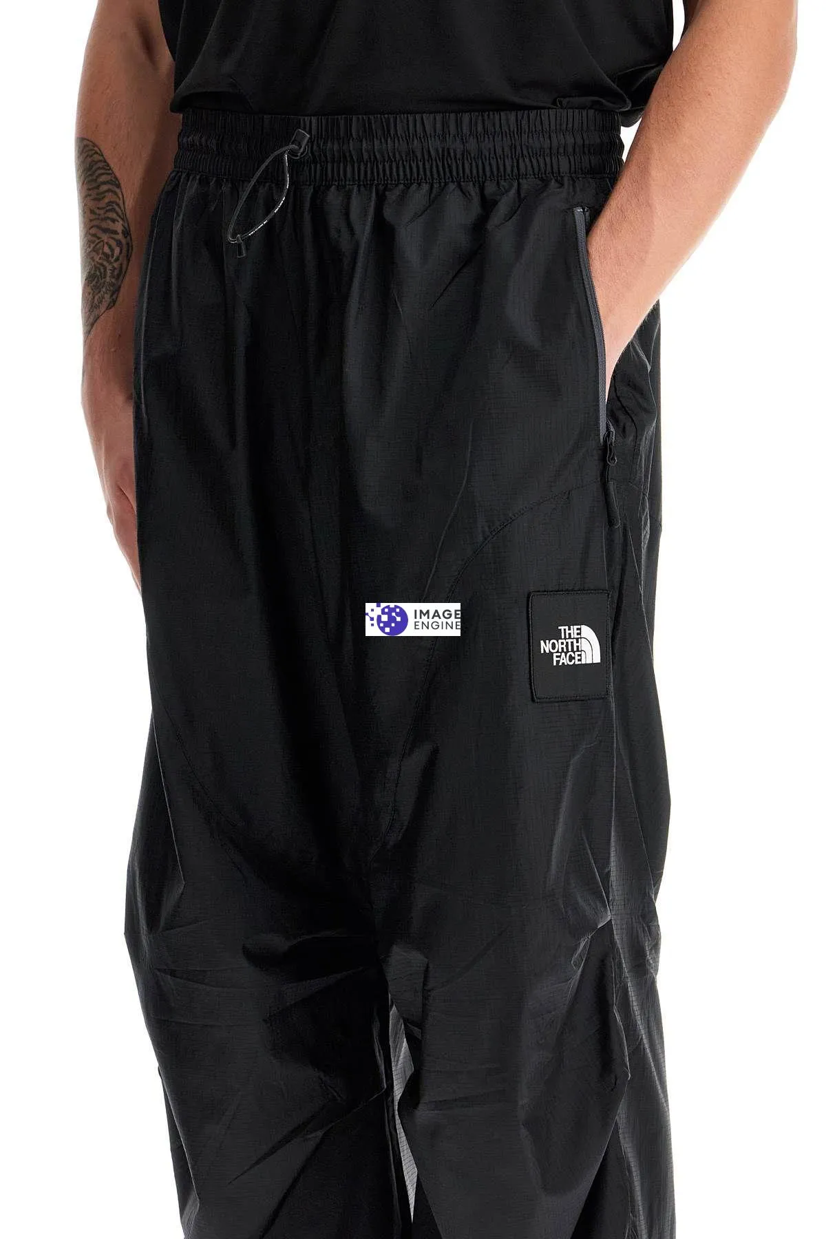 Pantaloni Wind Shell TNF x Yinka Ilori