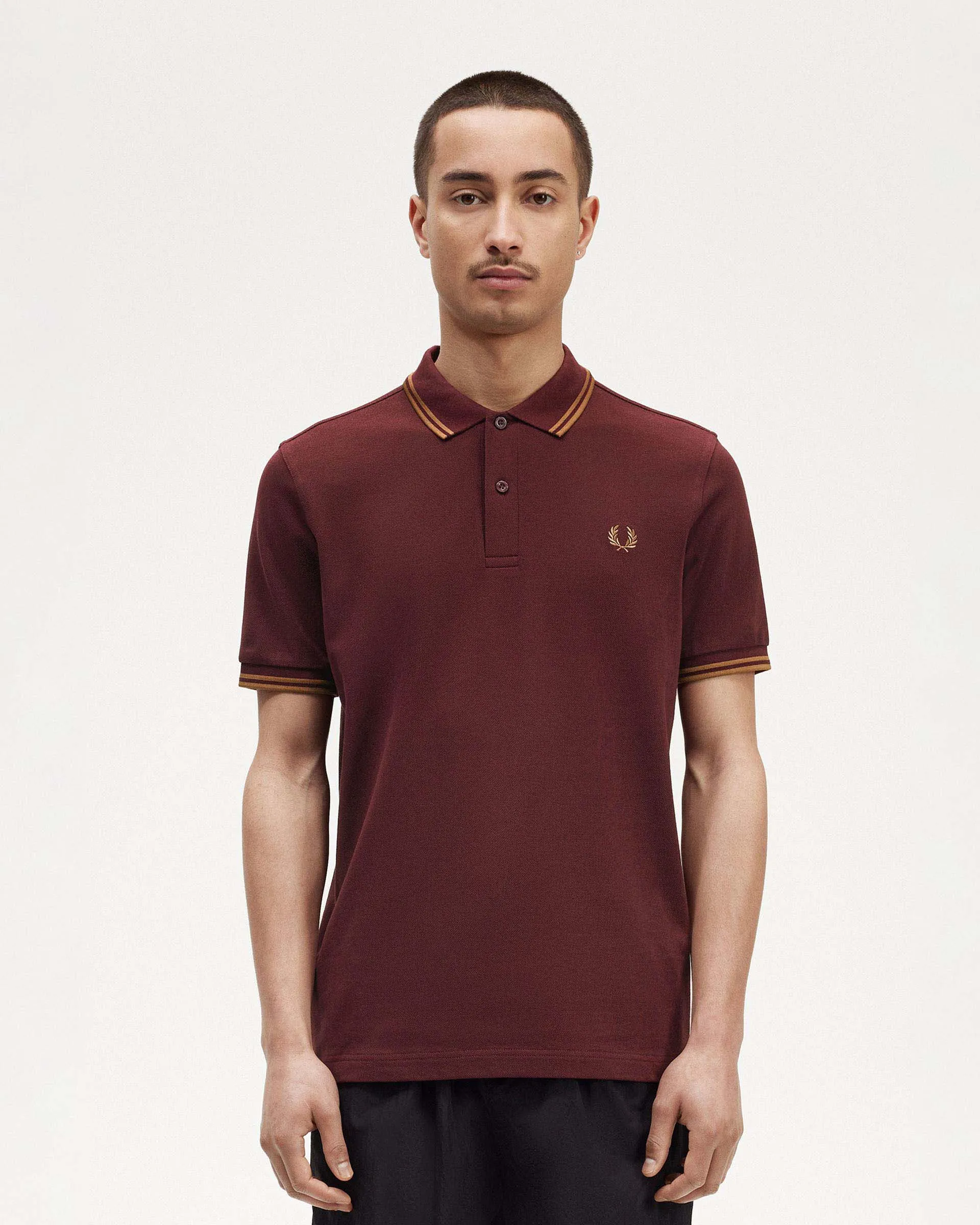 Polo mezza manica bordeaux con bordino color rame